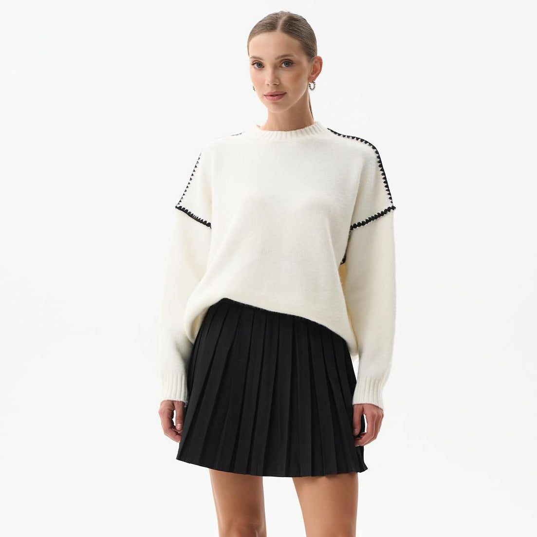 Women's elegant knit sweater with unique ribbed textures and fashionable accents NOVAE
