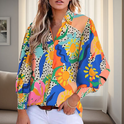 Women's shirt blouse in a vibrant floral design with dropped shoulders and elasticated cuffs NOVAE