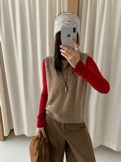 Women's knitted vest with soft, fluffy material and modern cut NOVAE