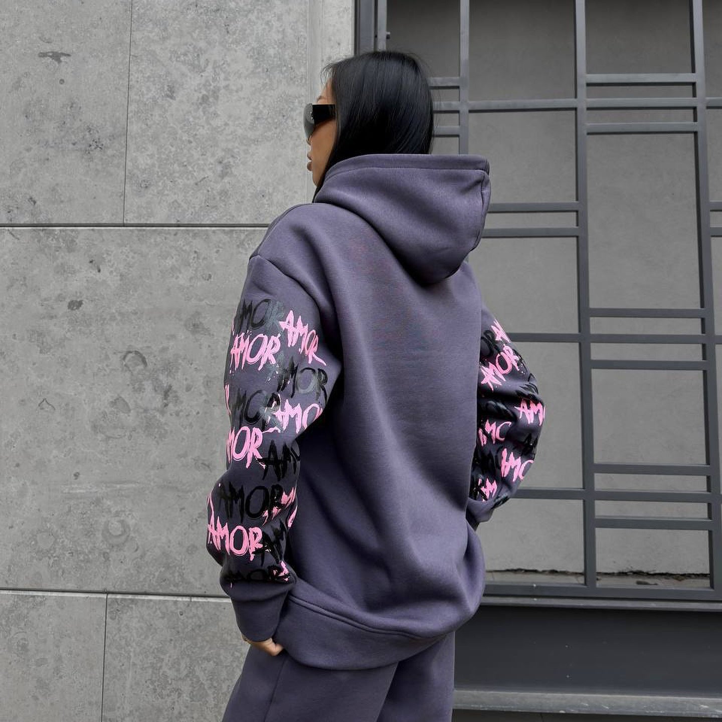 Women's hoodie with creative lettering and unique sleeve graphics NOVAE