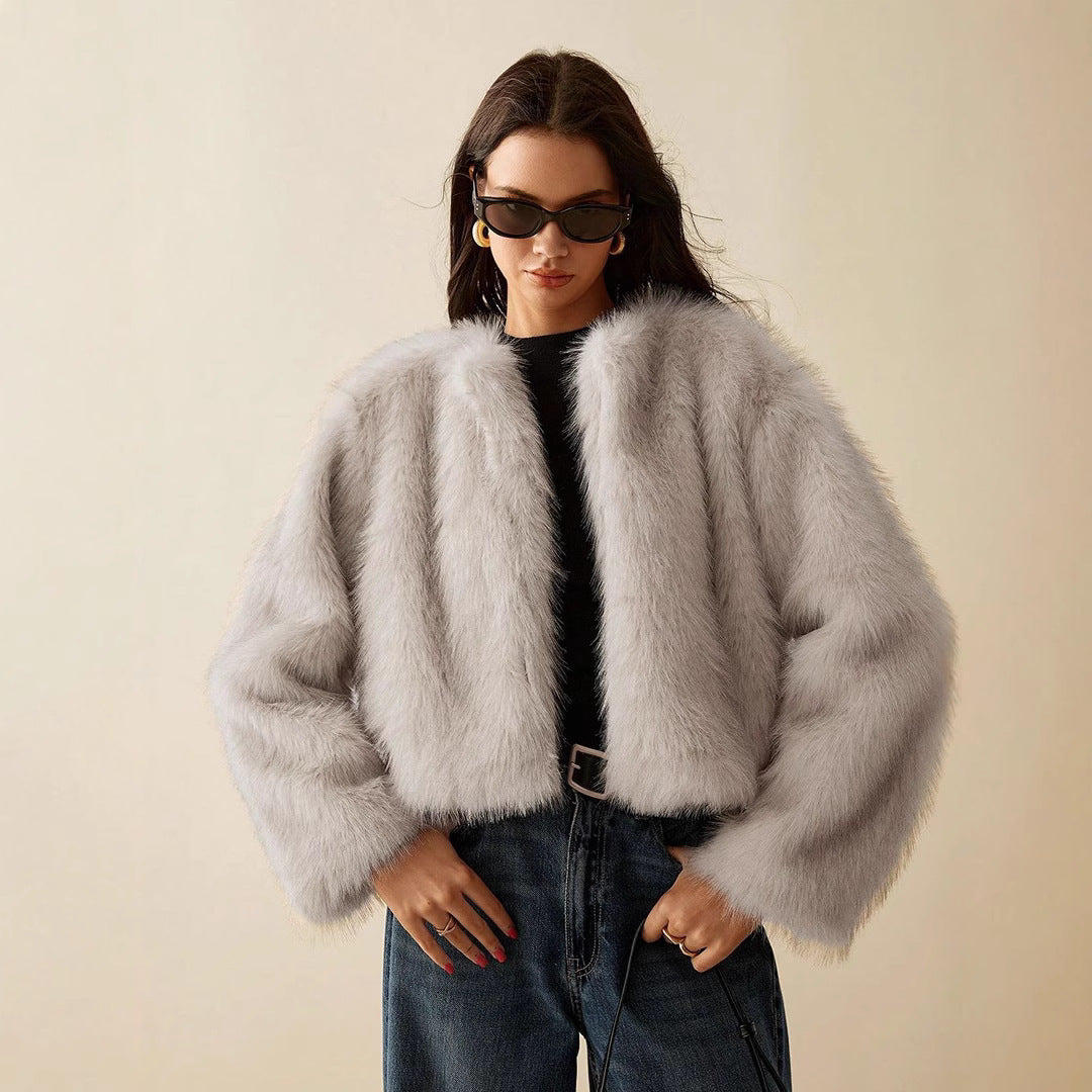 Women's extravagant short-sleeved fur jacket with voluminous sleeves NOVAE