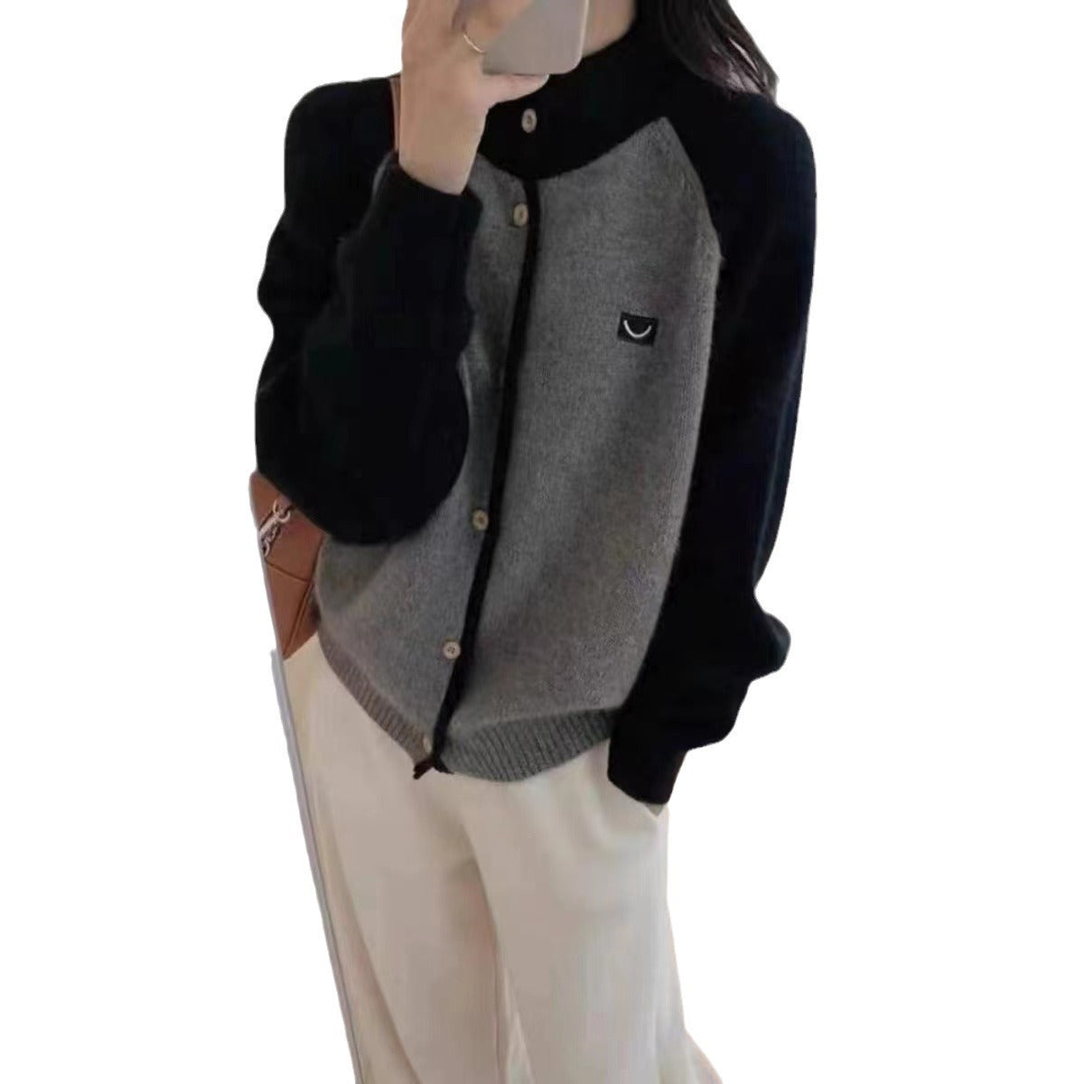 Women's knitted cardigan with elegant collar and button details NOVAE