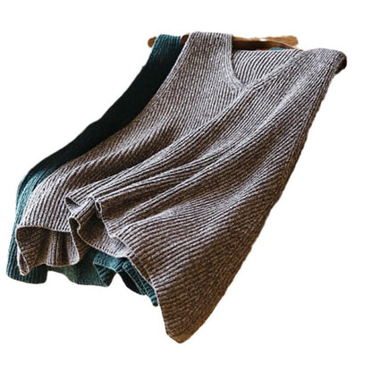 Women's knitted top with V-neck and airy silhouette NOVAE