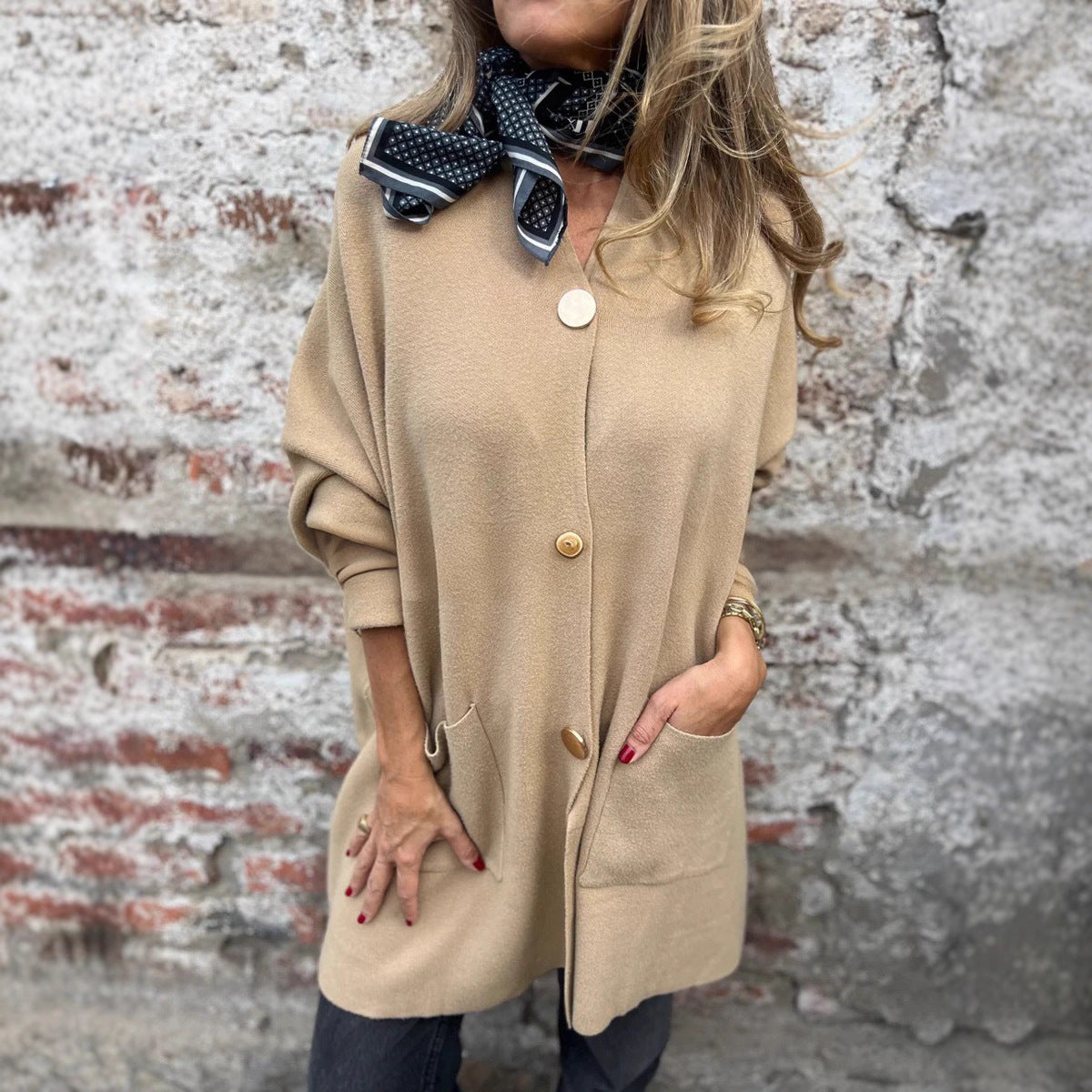 Women's fashionable cardigan with practical pockets and button closure NOVAE