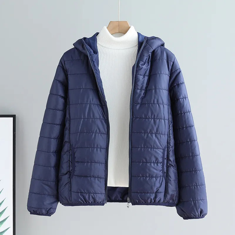 Women's quilted transitional jacket with practical pockets and hood NOVAE