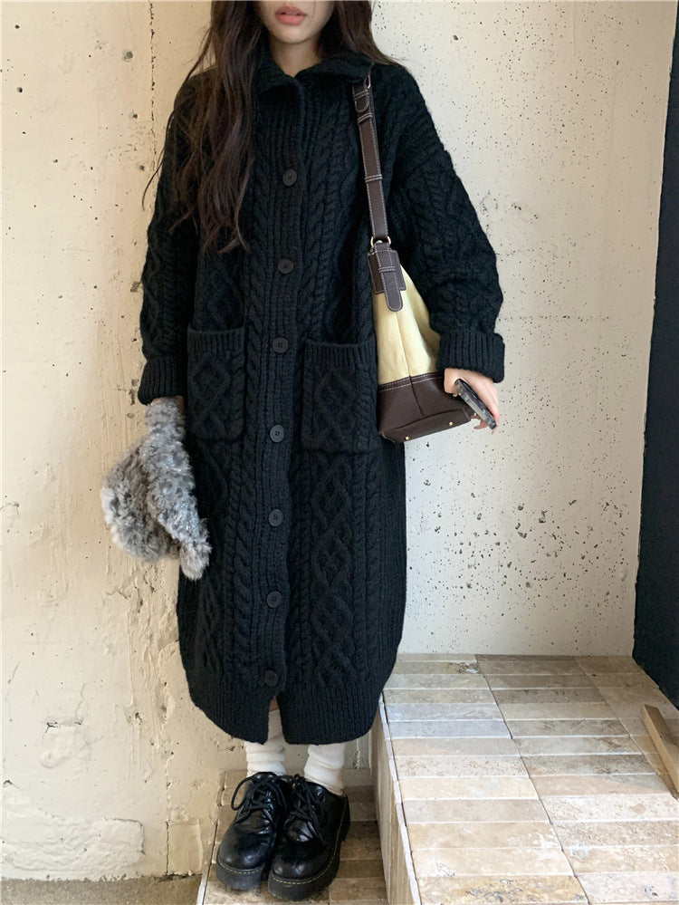 Women's chunky knit button-up coat with elegant cable pattern and practical pockets NOVAE