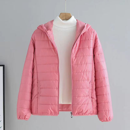 Women's quilted transitional jacket with practical pockets and hood NOVAE