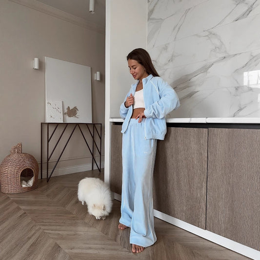 Women's leisure suit made of soft fleece with a high collar and practical pockets NOVAE