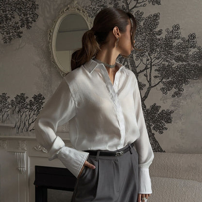 Women's elegant blouse with adjustable cuff design and button details NOVAE