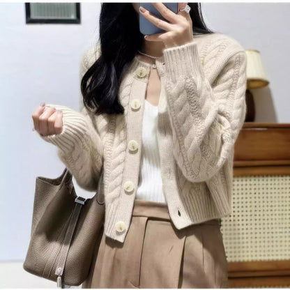 Women's chunky knit cardigan with decorative buttons and special cable pattern NOVAE