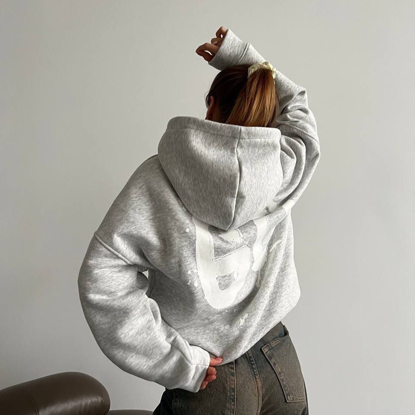 Women's oversized hoodie with a comfortable cut and casual sleeves NOVAE