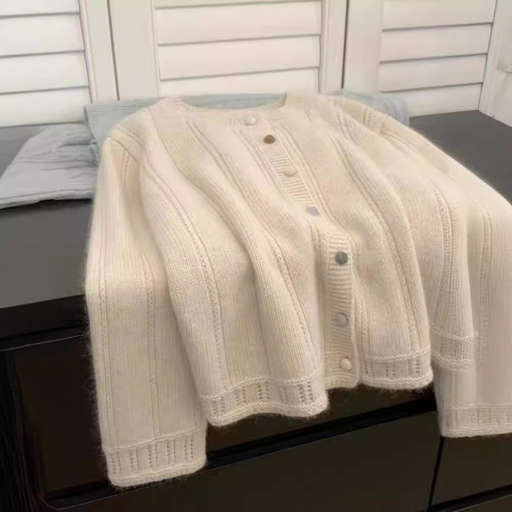 Women's cardigan with decorative rib design and button closure NOVAE