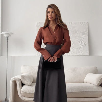 Women's elegant blouse with adjustable cuff design and button details NOVAE