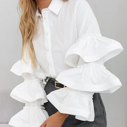 Women's blouse with voluminous ruffle details and classic collar NOVAE