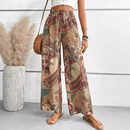Women's wide-leg palazzo pants with colorful paisley pattern and elastic waistband NOVAE