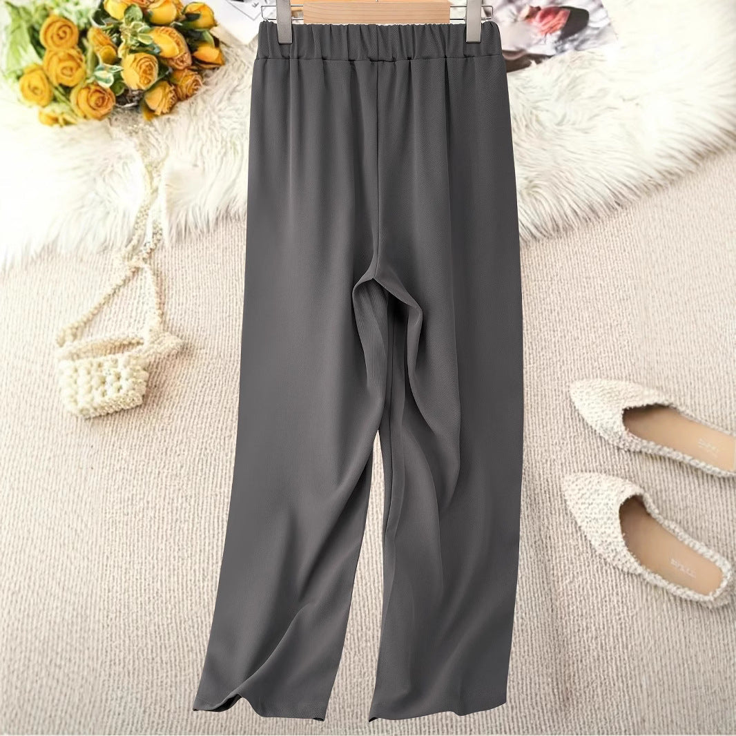 Women's elegant wide pleated trousers NOVAE