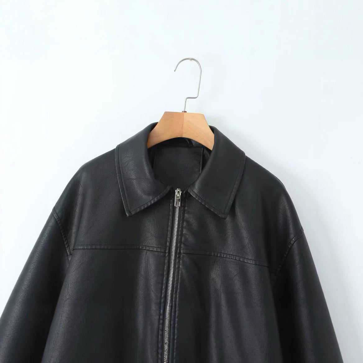 Women's casual leather jacket with elasticated hem and practical pockets NOVAE