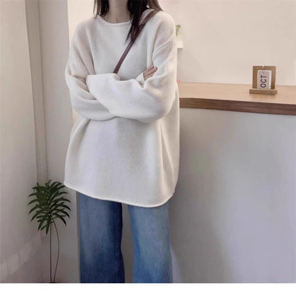 Women's oversized knit sweater with a relaxed fit and high collar NOVAE