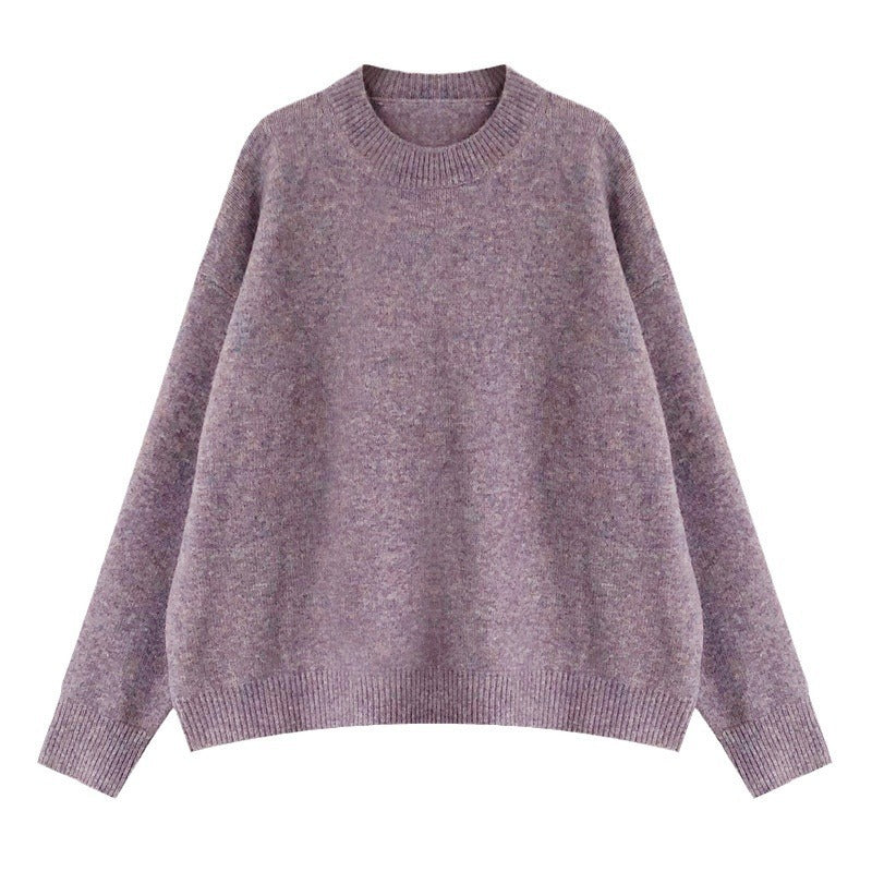 Women's oversized knit sweater with a wide cut and high cuffs NOVAE