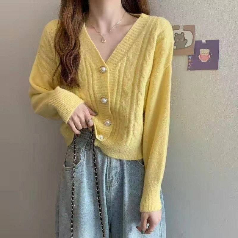 Women's cardigan with elegant cable knit pattern and high-quality button details NOVAE