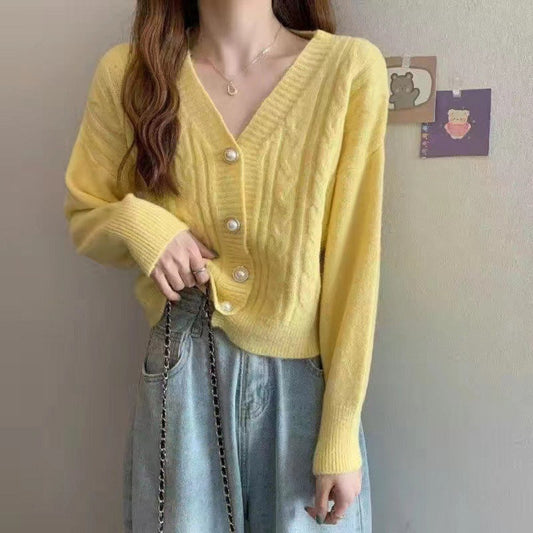 Women's cardigan with elegant cable knit pattern and high-quality button details NOVAE