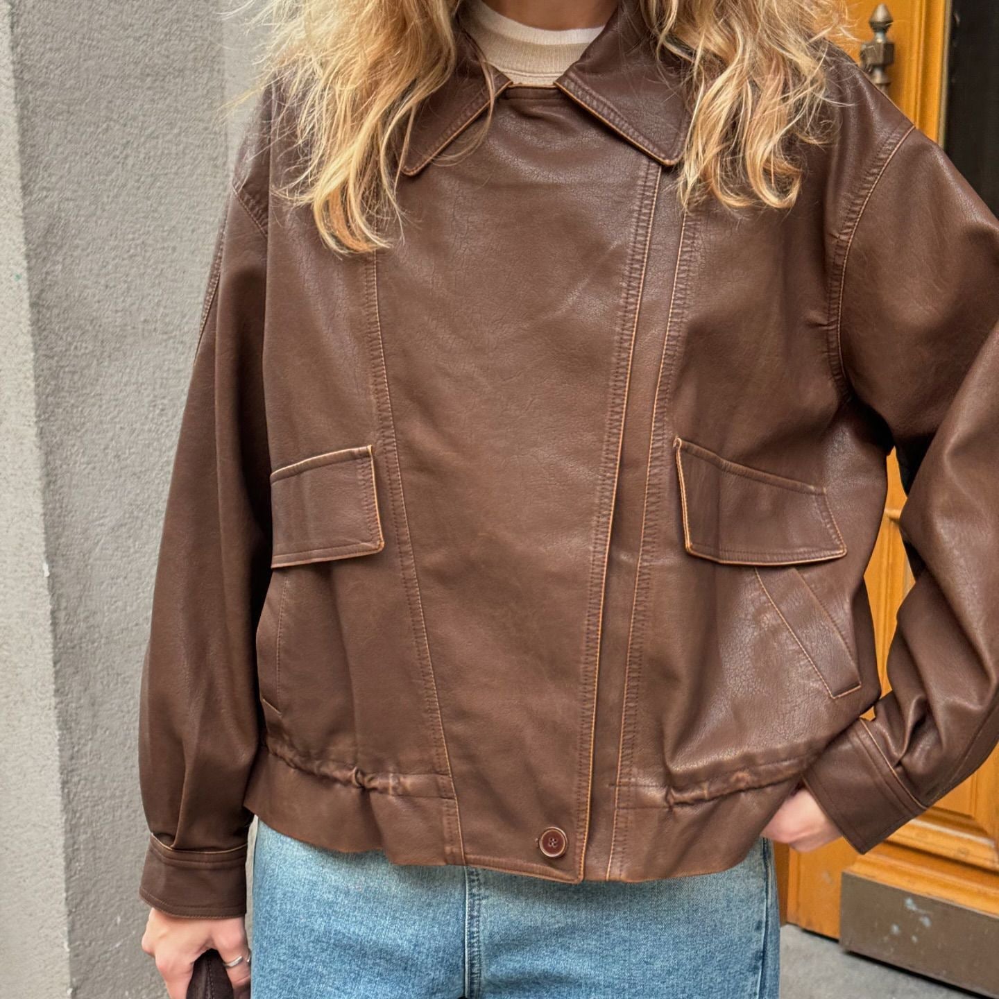 Women's fashionable leather jacket with oversized cut and practical pockets NOVAE