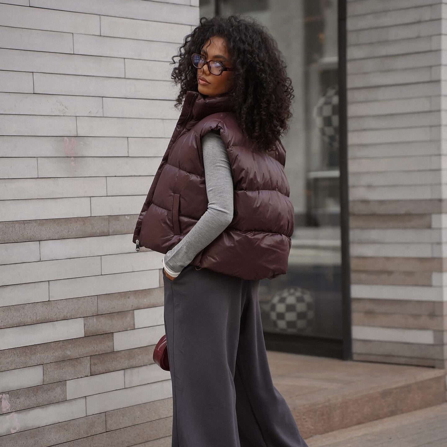 Women's quilted vest with high collar and practical zipper NOVAE