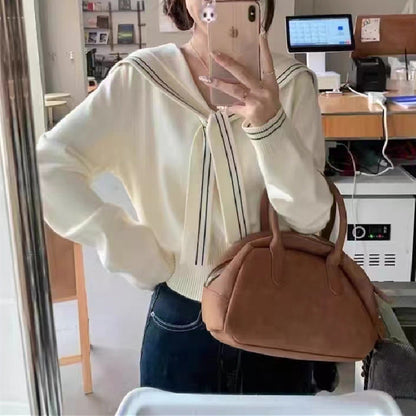 Women's stylish sweater with bow collar and fine knit structure NOVAE