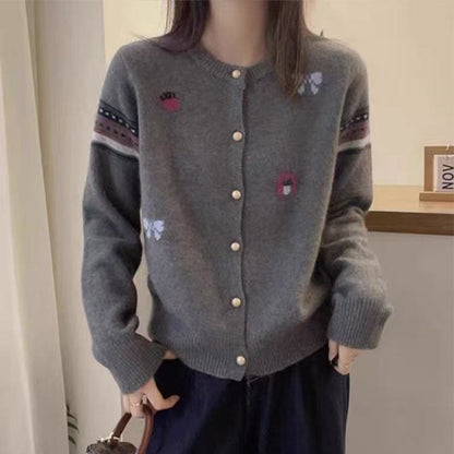 Women's cardigan with elegant appliqués and button details NOVAE