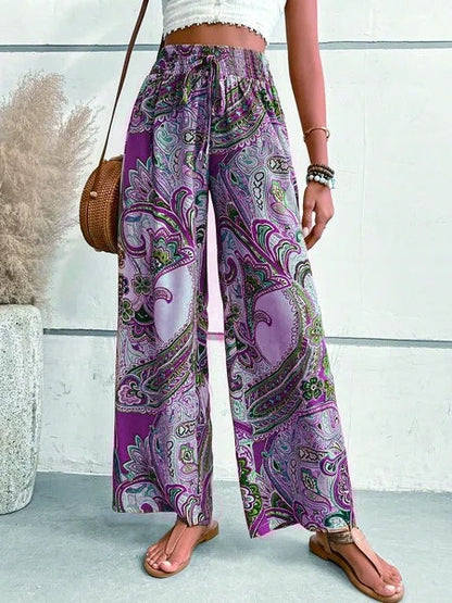 Women's wide-leg palazzo pants with colorful paisley pattern and elastic waistband NOVAE
