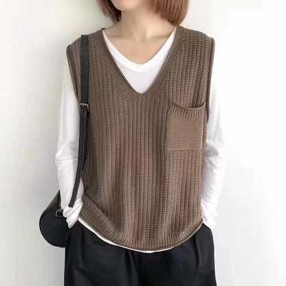 Women's knitted vest with V-neck and practical chest pocket NOVAE