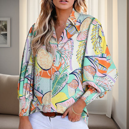 Women's shirt blouse in a vibrant floral design with dropped shoulders and elasticated cuffs NOVAE