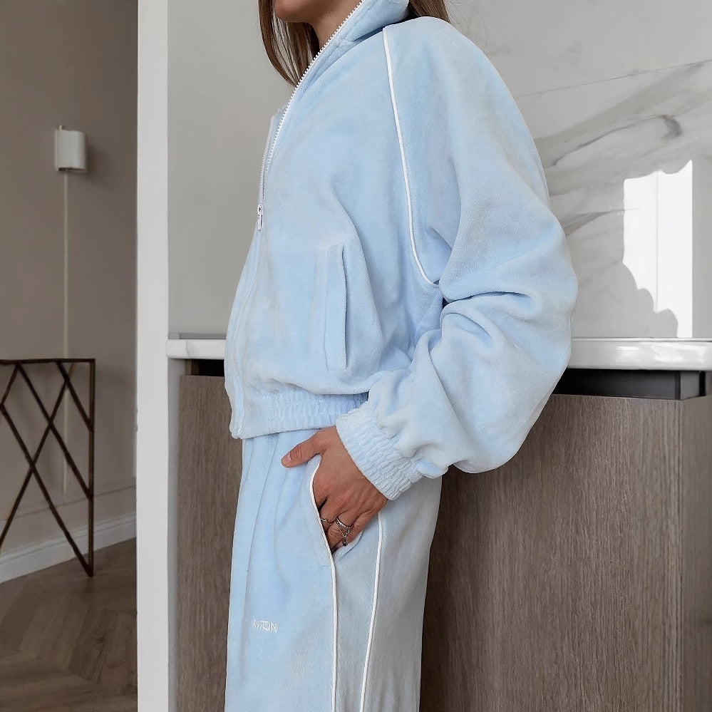 Women's leisure suit made of soft fleece with a high collar and practical pockets NOVAE