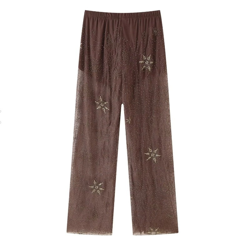 Women's elegant sheer palazzo pants with sparkling appliqués NOVAE