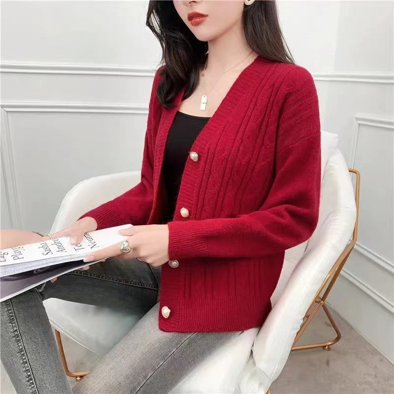 Women's cardigan with elegant cable knit pattern and high-quality button details NOVAE