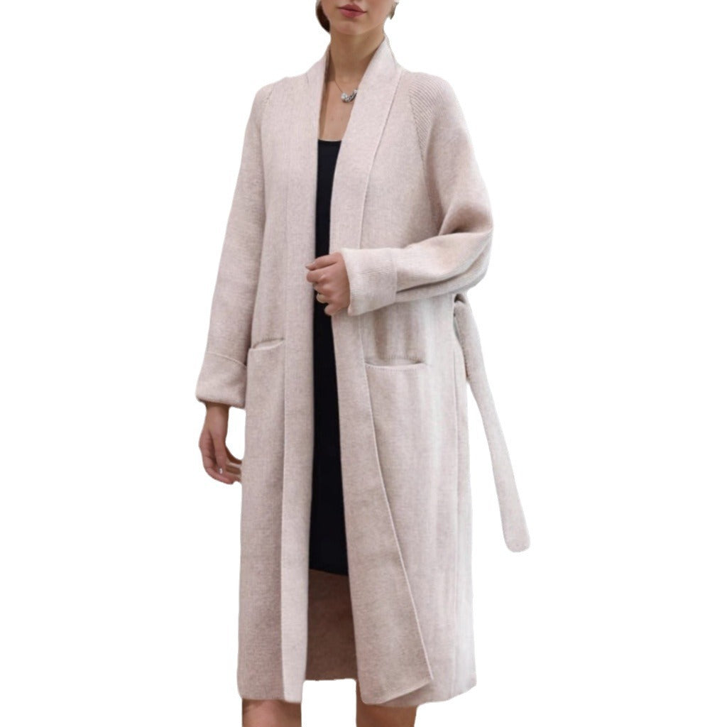 Women's long knitted coat with open cut and practical pockets NOVAE
