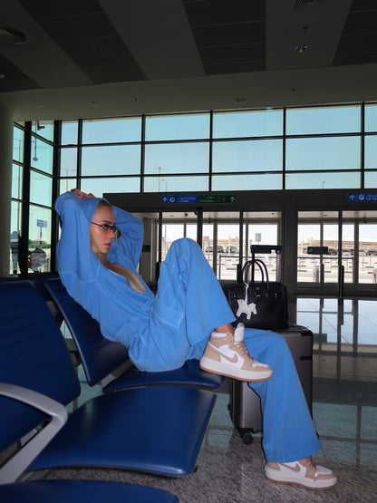 Women's comfortable leisure suit with hood and practical pockets NOVAE