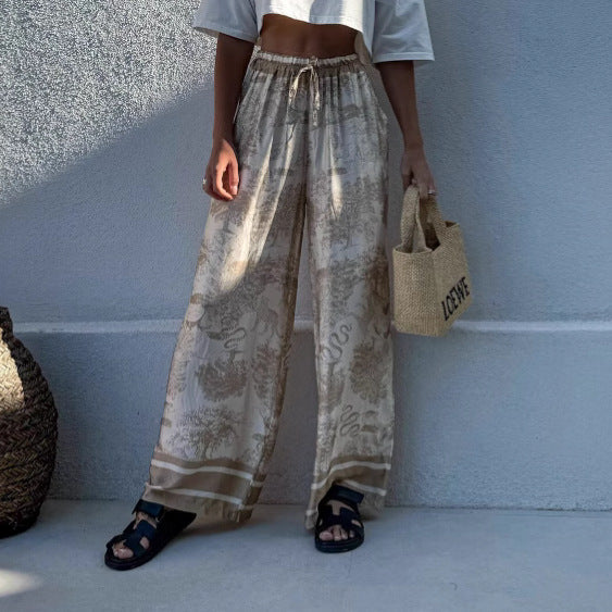 Women's wide-leg palazzo trousers with floral pattern and elasticated waistband NOVAE