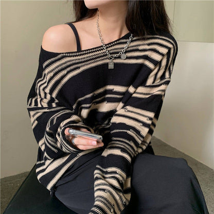 Women's knitted sweater with an elegant striped pattern and a relaxed fit NOVAE