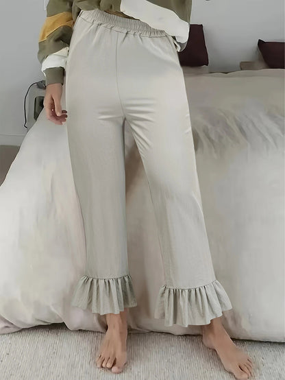 Women's casual trousers with ruffled trim NOVAE