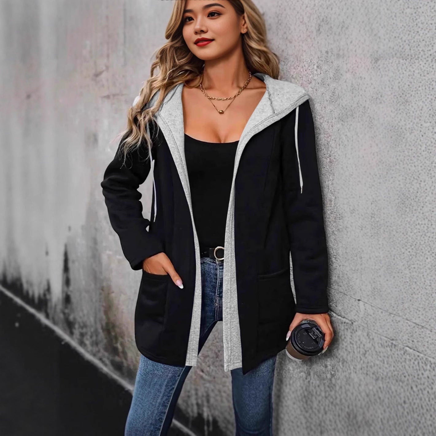 Women's casual hooded jacket with practical pockets and a modern cut NOVAE