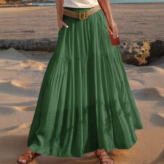 Women's wide-flared maxi skirt with elegant pleats and practical pockets NOVAE