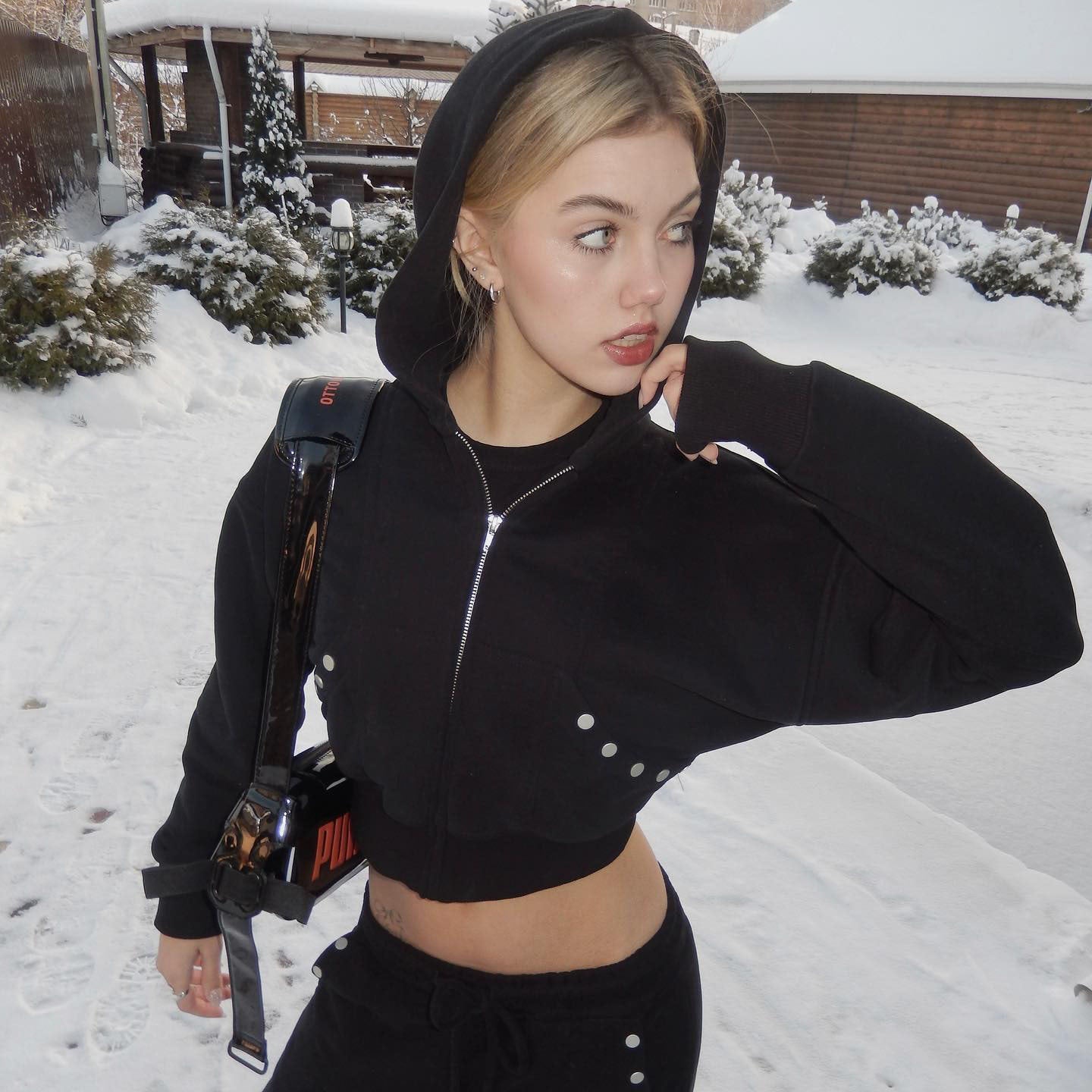 Women's sporty cropped hoodie with innovative snap button details NOVAE