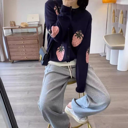 Women's playfully patterned cardigan with button detail NOVAE