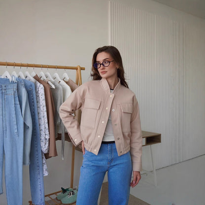 Women's fashionable short jacket with practical pockets and a cool collar NOVAE