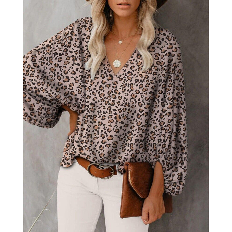 Women's blouse with wide puff sleeves and elegant V-neck NOVAE