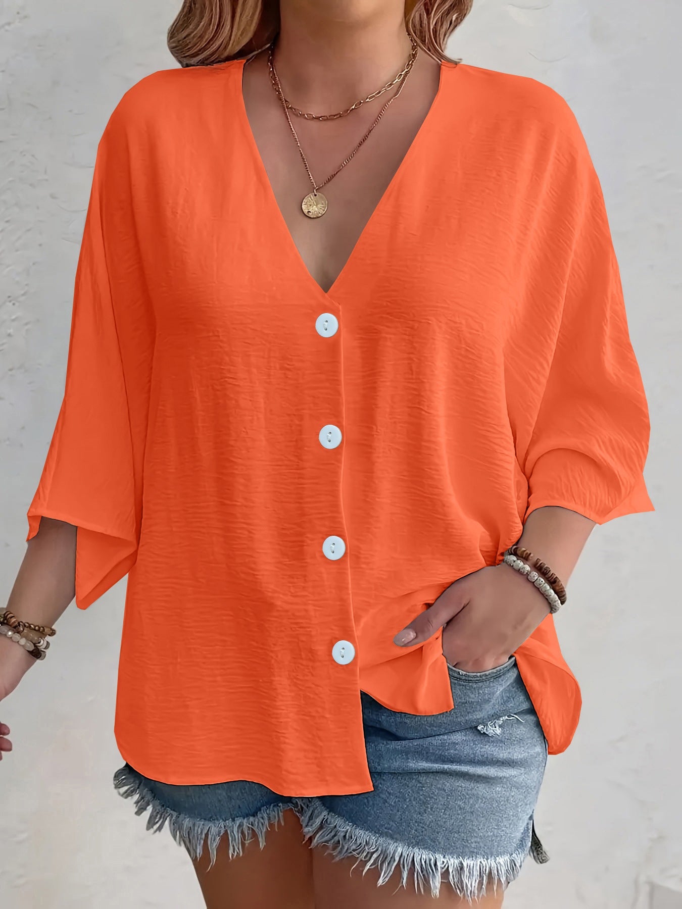 Women's flattering short-sleeved blouse with button placket and V-neck NOVAE