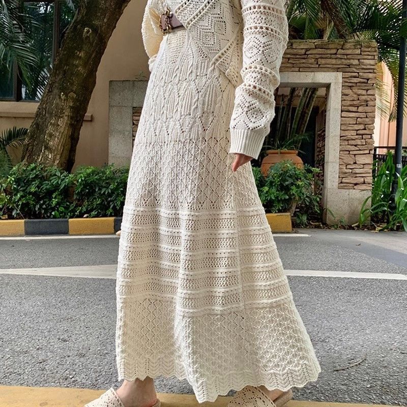 Women's knit dress with fine openwork pattern and elegant button details NOVAE