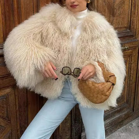 Women's fluffy faux fur jacket in a long cut with wide flared sleeves NOVAE