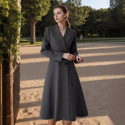 Women's elegant maxi coat with double-breasted button closure and wide, flowing skirt NOVAE